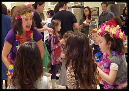 Daisy Doodle gives hula dance lesson at Hawaiian party in Manhattan nyc