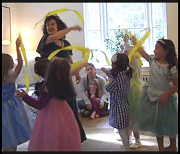 Kids dance with streamer wands at birthday party Queens NYC