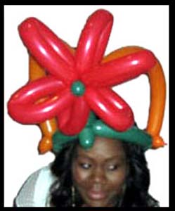 Daisy Doodle twisted herself a balloon holiday hat for a Chanukah party in Brooklyn ny