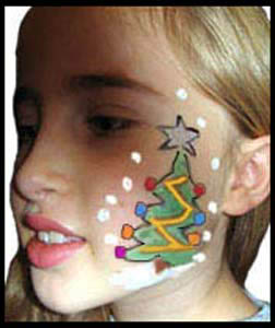 Girl gets her face painted with Christmas tree