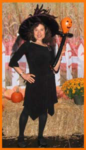 Daisy Doodle Diabolica dressed as a friendly witch at kids halloween party nyc