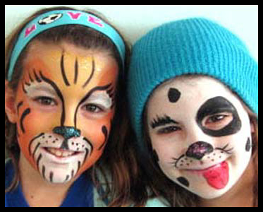 Older kids get animal face painting by Daisy Doodle at party in Connecticut