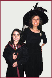 Harry Potter magician Daisy Doodle and birthday girl in costume for Harry Potter magic show in Manhattan NYC