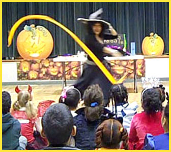 Kids party entertainer Daisy Doodle starts off her Halloween party magic show with music and props for a grand opening number Westchester NY