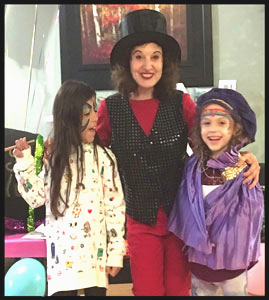 Birthday girl and friend help magician Daisy Doodle with magic show in Bronx NYC